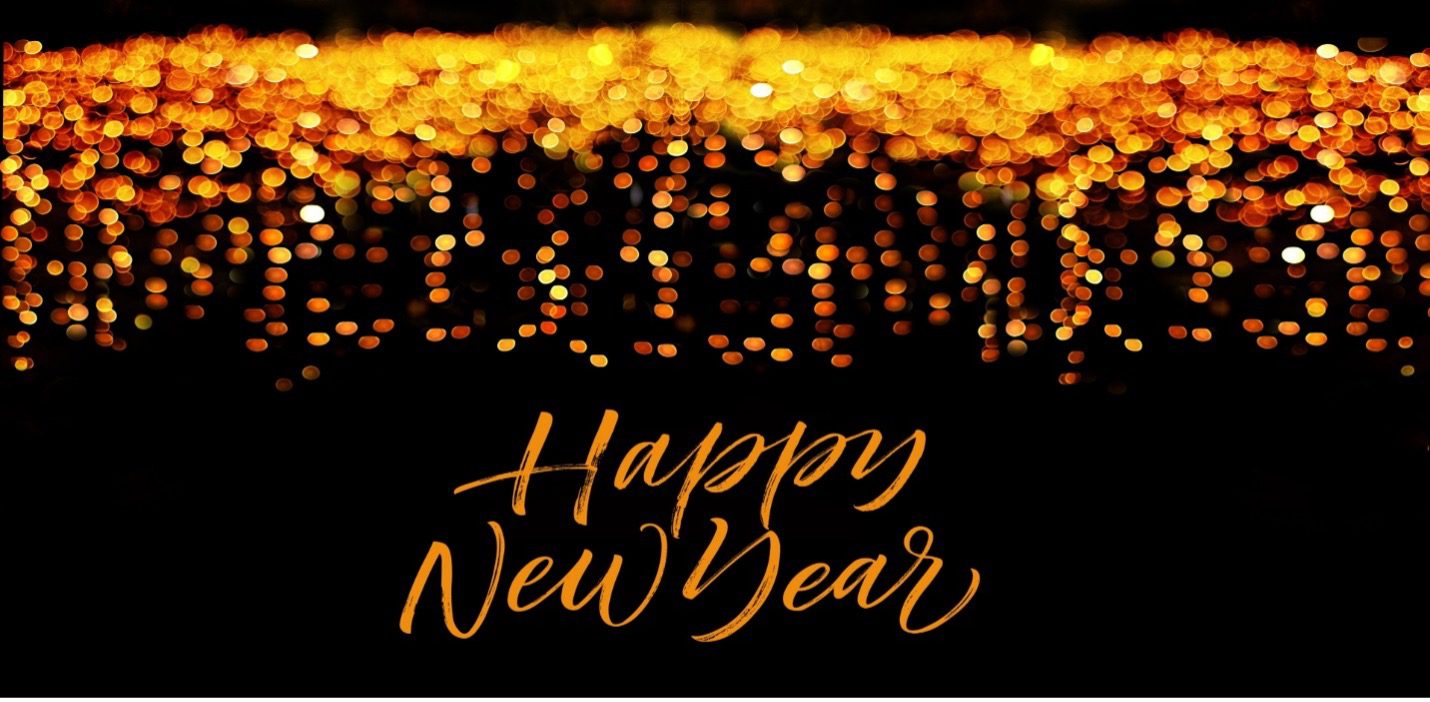 Happy New Year with golden bokeh lights.